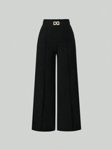 Black wide-leg pants with a belt on a light gray background