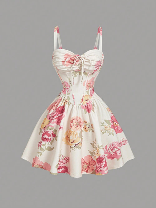 Floral dress with pink and orange flowers on a gray background