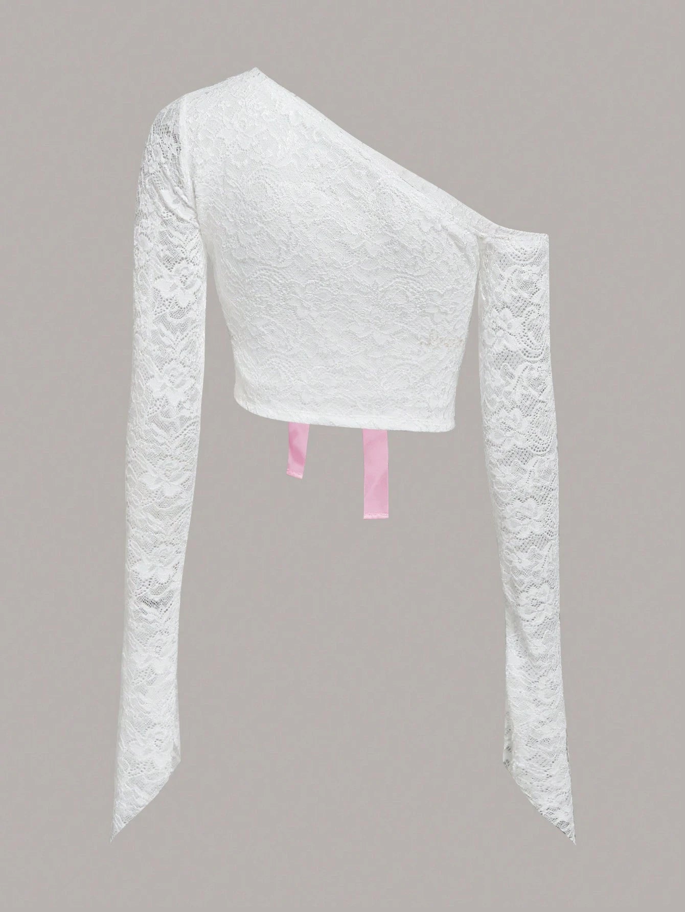 White lace one-shoulder top on a gray background