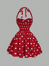 Red polka dot dress on a gray background