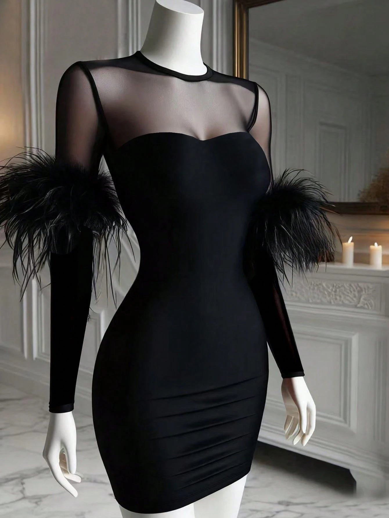 Black dress with sheer sleeves and feather details on a mannequin against a decorative wall.