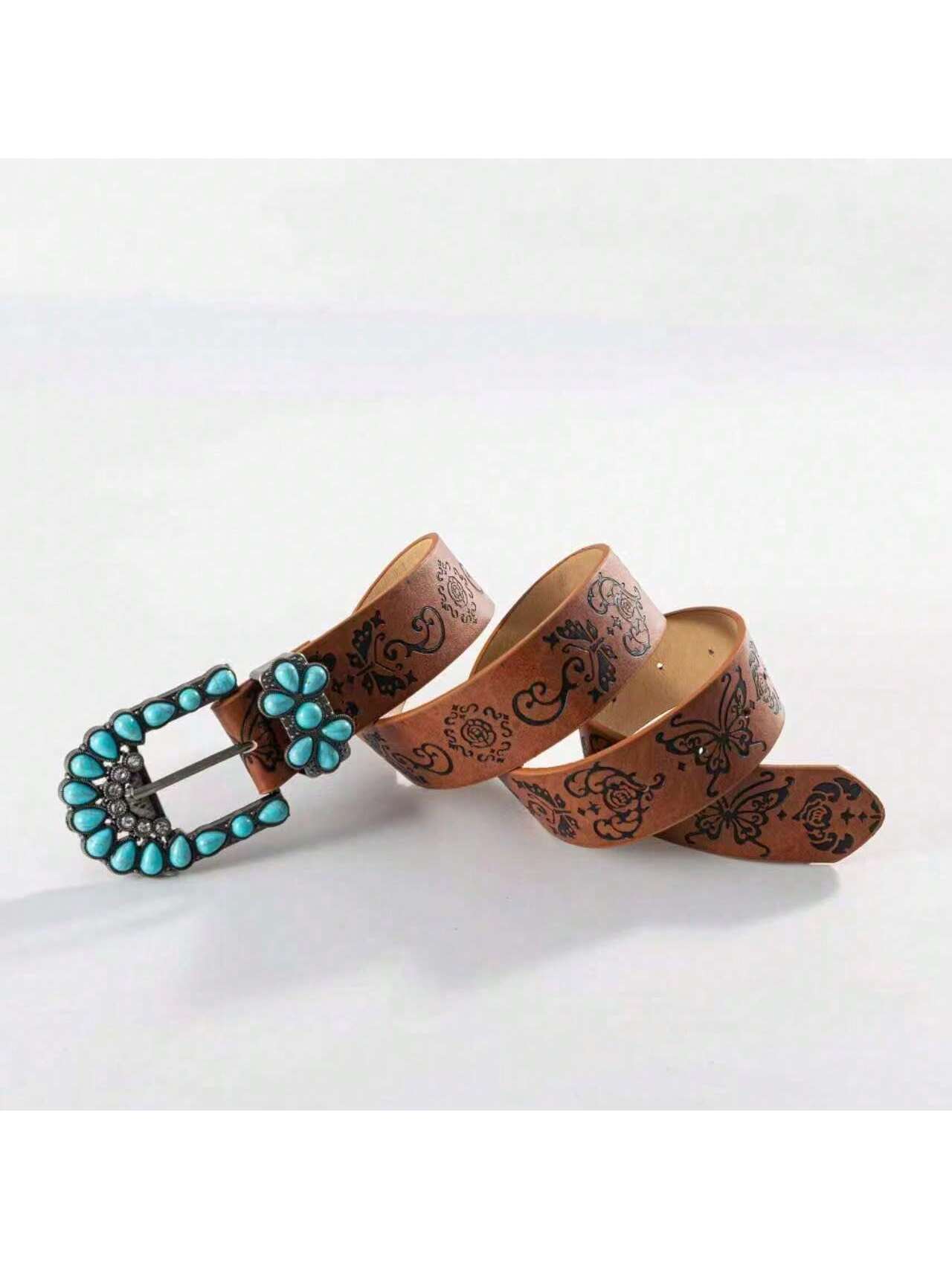 Brown leather belt with turquoise buckle on a white background