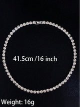 Silver necklace with measurement text on a black background