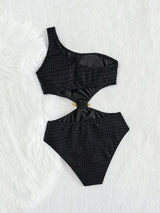Black checkered bikini set on a white background