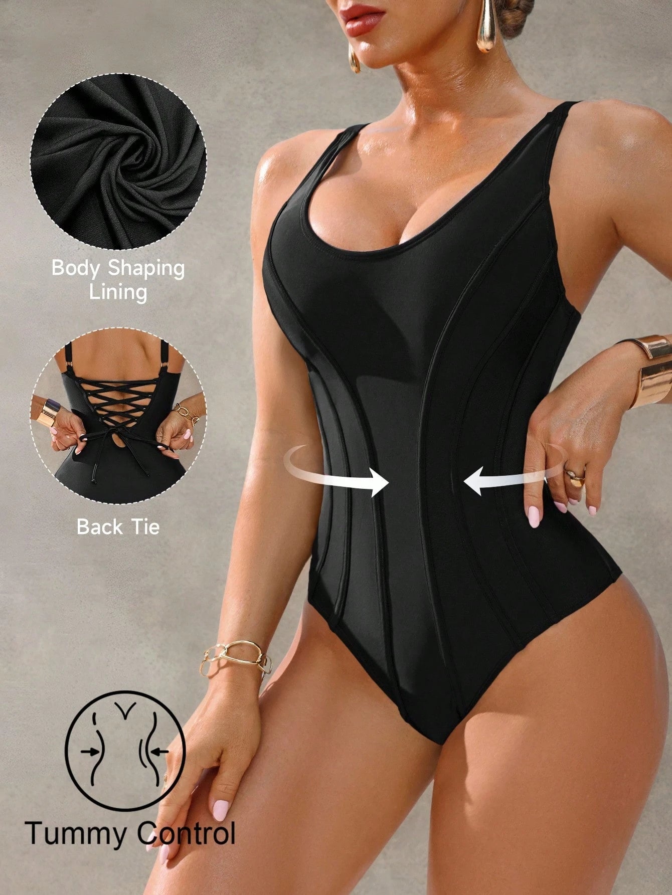 Black swimsuit with body shaping lining and back tie feature, on a neutral background.