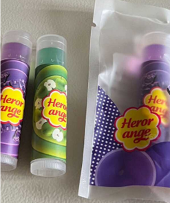 SHEIN Herorangeh Lip Balm Candy Flavor, Cool & Moisturizing Texture, Hydrating, Exfoliating, Reducing Fine Lines, Portable And Convenient For Students, Travel, And Special Occasions, Net Weight 4g.png
