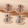 SHEIN 1pair Exaggerated Fashionable Eye-Shaped Imitation Faux Pearl Earrings