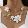 SHEIN 1pc Metal Hollow Flower Oil Drop Necklace, Oversized Golden Flower Necklace